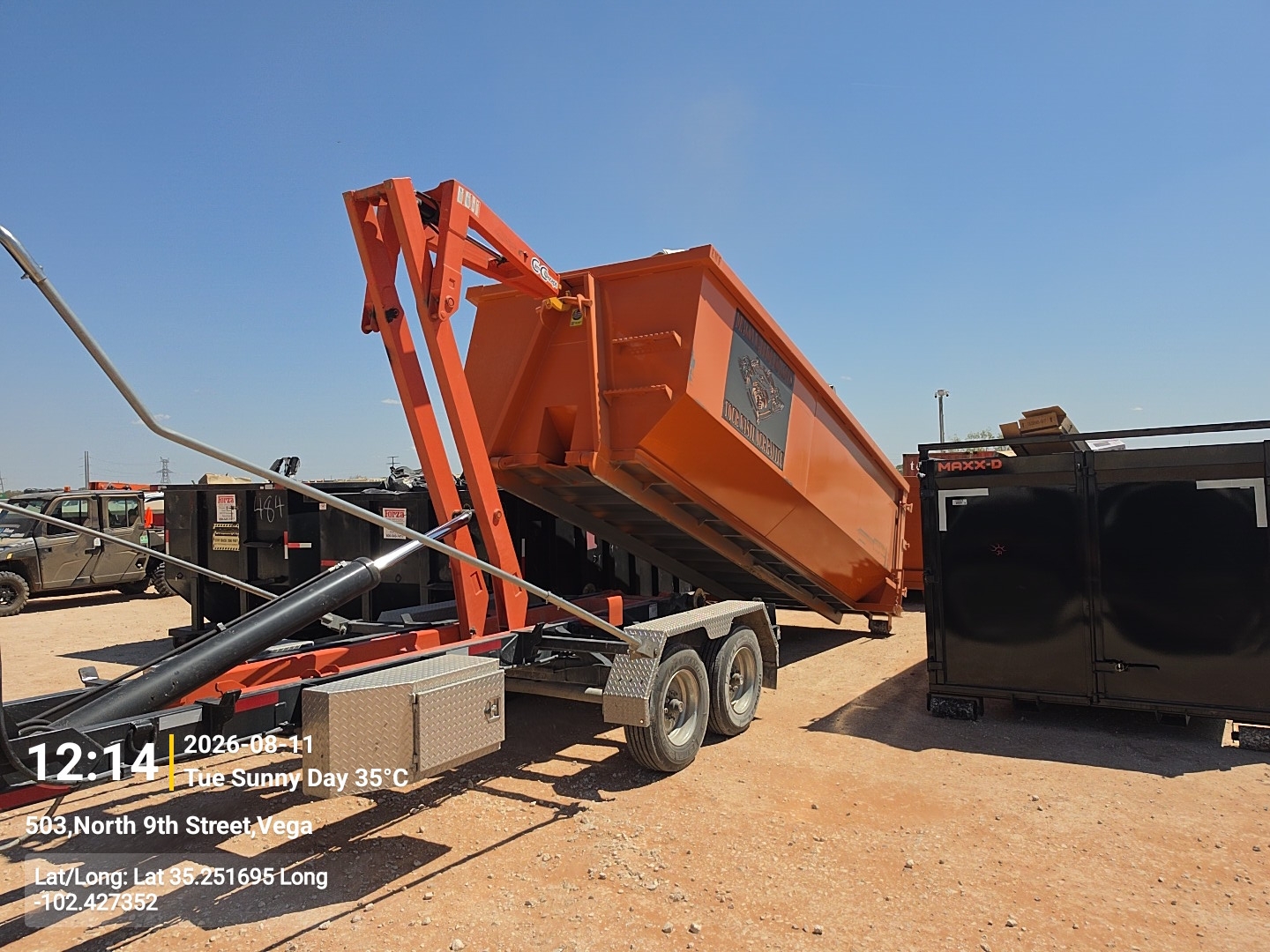 25 yard roll off dumpster being rolled off the truck in Potter County TX